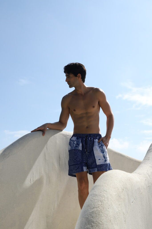 BLUE NEWS SWIM TRUNKS